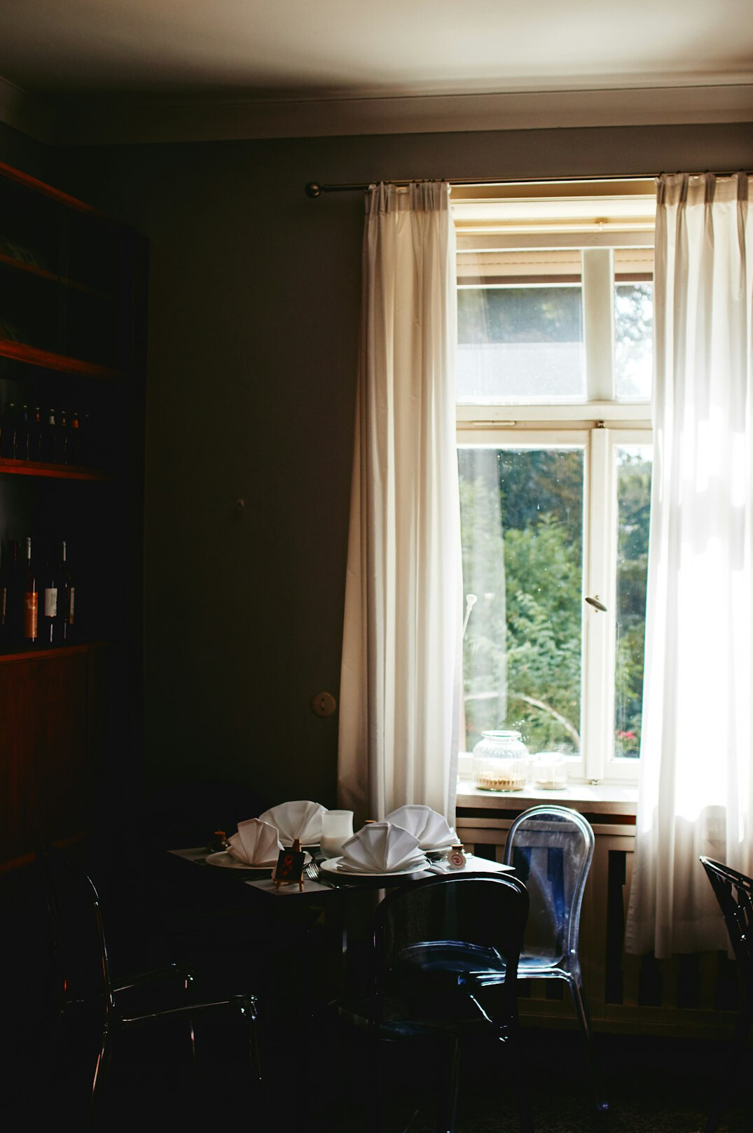 Vintage camera on a table by a window