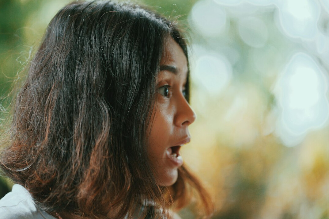 Portrait of a smiling woman with brown hair