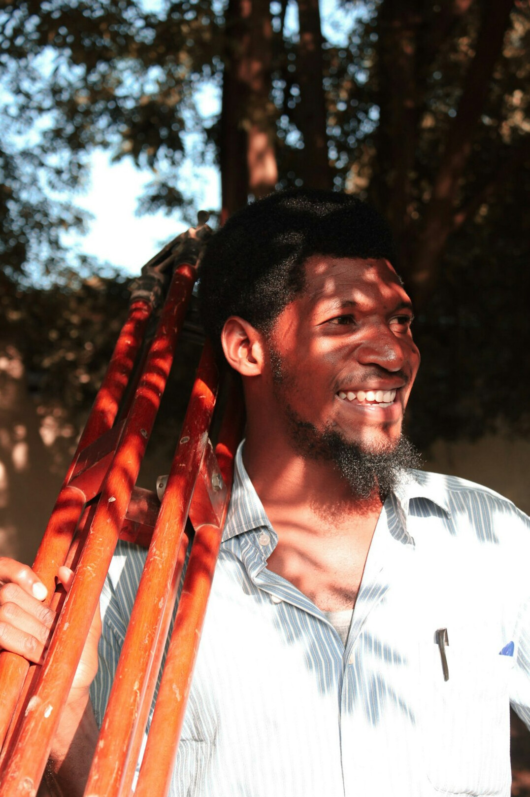 Portrait of a smiling man in a casual shirt